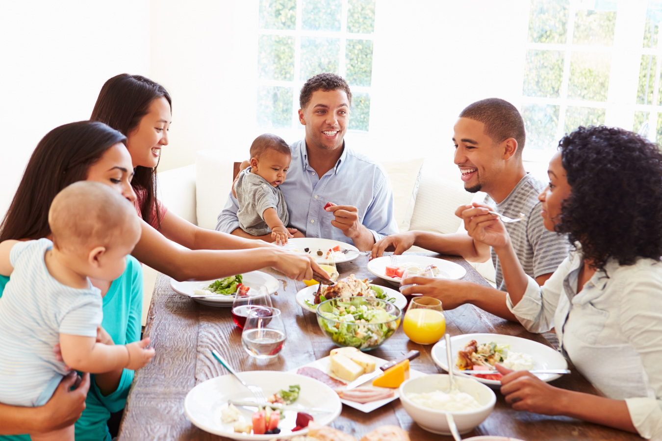 friends and family at the dinner table