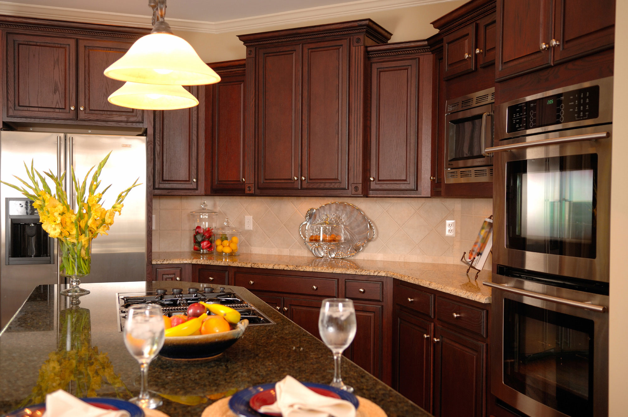 kitchen with dark cabinets and stainless appliances 