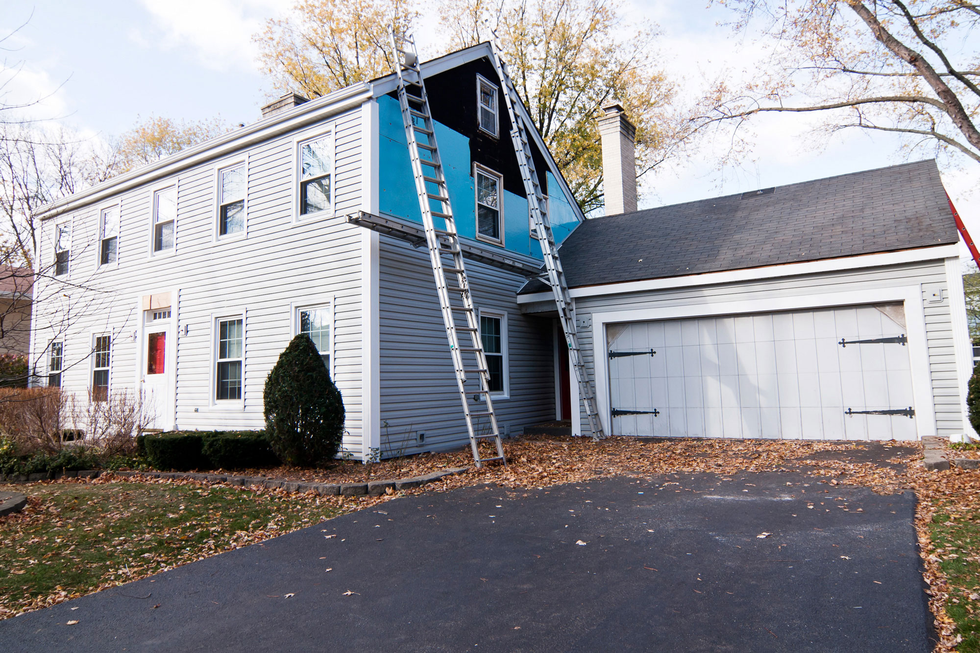 new siding being installed on home 
